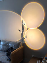 Load image into Gallery viewer, Minimalist creative LED light and shadow floor lamp living room sofa lamp Italian art projection sunset designer floor lamp
