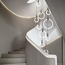 Load image into Gallery viewer, Duplex staircase chandelier modern minimalist hotel lobby stair lamp Nordic villa living room rotating stair long chandelier
