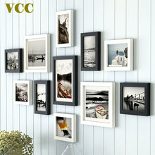 Load image into Gallery viewer, 11 Pcs Nordic Style Natural Wood Photo Frame Photo Black and White Color,Cheap Wood Wall Art Picture Frames Set for Living Room
